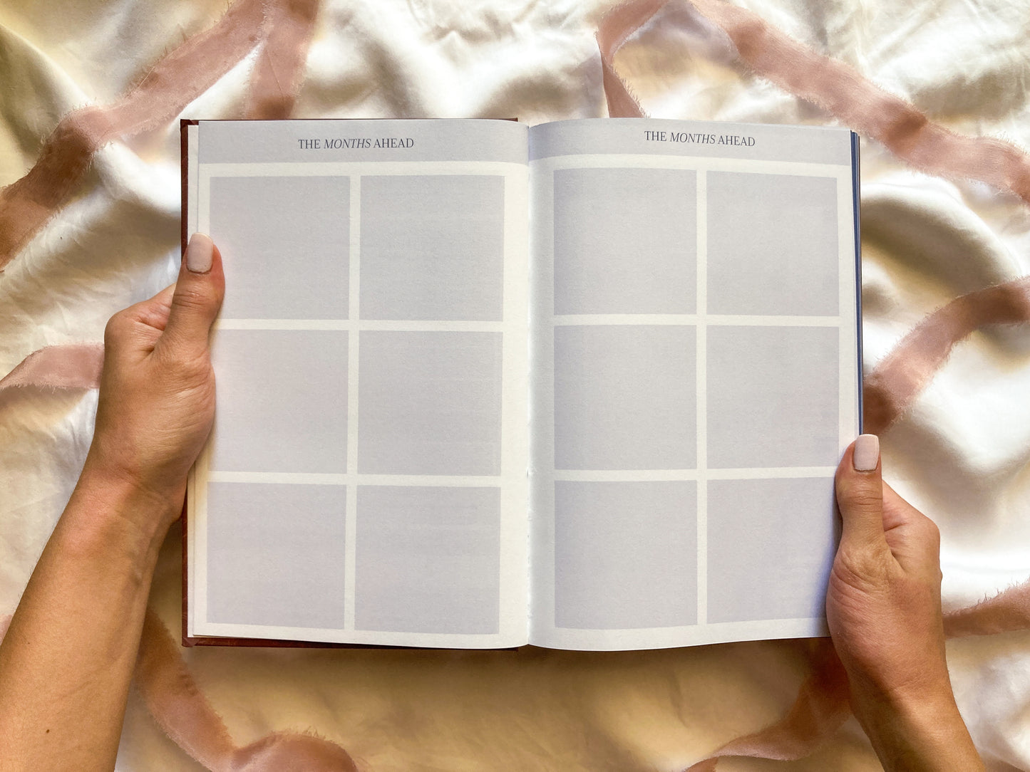 Image of Reawaken Planner spread to plan your upcoming months.
