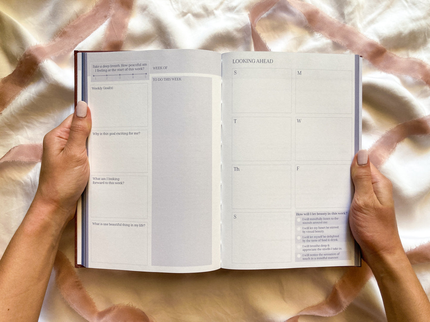 Image of Reawaken Planner weekly spread. Spaces to plan your week ahead, for your to-do list, for your weekly goals, & a space to positively engage with your week.